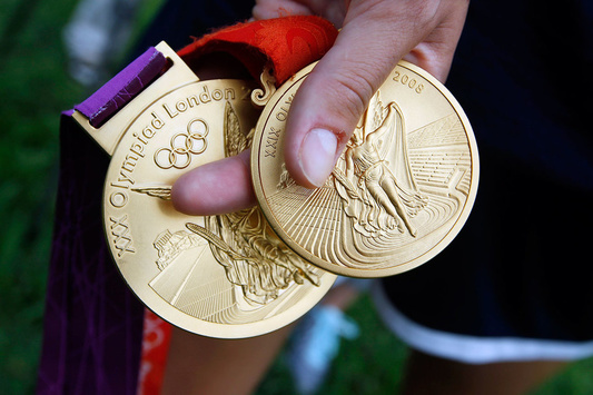Російські легкоатлети повинні повернути 23 олімпійські медалі