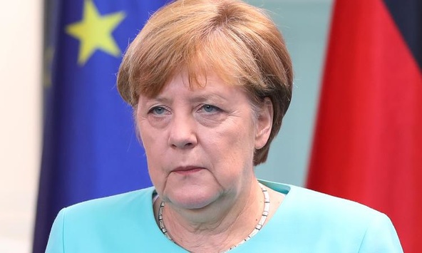 Меркель каже, що Україна пообіцяла почати виконання політичної частини Мінська