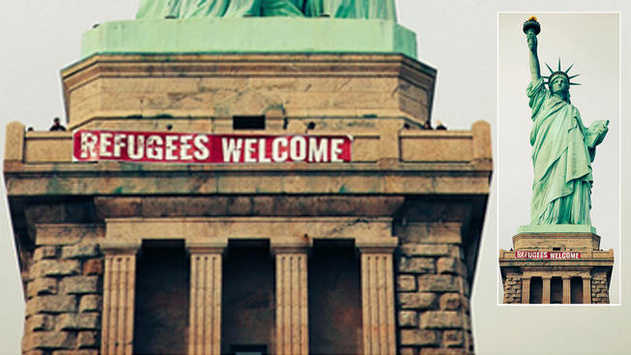 На статую Свободи вивісили банер «Біженці, ласкаво просимо»