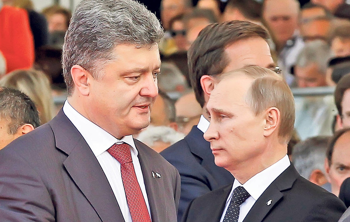 «Жартували, аби не посваритись»: Російські ЗМІ розповіли про розмову Путіна і Порошенка