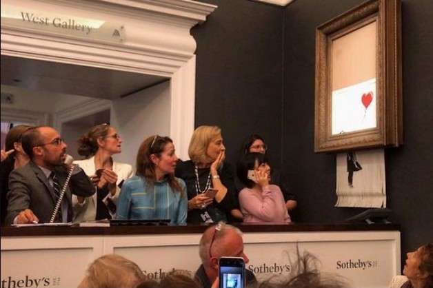 Бенксі показав підготовку до самознищення своєї картини на аукціоні Sotheby's