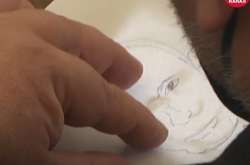 Львівський депутат обурив соціальні мережі малюванням портрету Путіна під час сесії (відео)