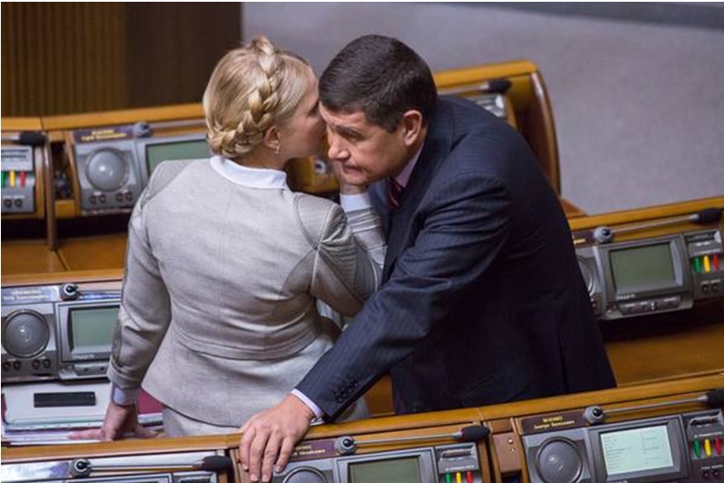 Премьер обвиняет министра в работе на одиозного депутата Онищенко