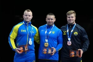 Анатолій Новописьменний (у центрі) здобув золото Всесвітніх ігор