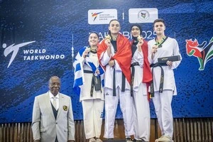 У ваговій категорії до 73 кг українка Куц (праворуч) виграла два поєдинки