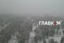 Київ здивував погодою: місто засипало величезними сніжинками (фото, відео)