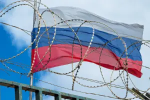 Заборона на пронесення російських прапорів діє на змагальних майданчиках, у медіацентрі та Олімпійському селищі