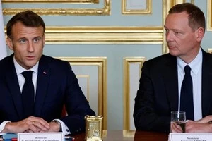 Президент Еммануель Макрон та його радник Еммануель Бонн