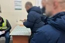 Гроші за безкоштовну довідку для ветерана ЗСУ: у Києві затримано експрацівника лікарні