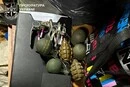 Автомати, гранати та 8 тис. набоїв: у Києві викрито торговців зброєю (фото)