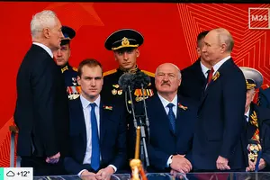 Микола Лукашенко потрапив у кадр поруч із Путіним