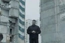 Командир РДК Капустін звернувся до росіян на тлі зруйнованої багатоповерхівки у Києві