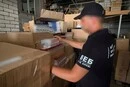Контрафакт на 12 млн грн: у Києві ліквідовано підпільний цех з алкоголем і цигарками