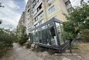 Замість балкона – прибудова для бізнесу: на Оболоні виникли суперечки через самобуд
