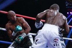 Мейвезер победил Берто в прощальном бою
