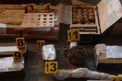 У гаражі на Запоріжжі виявили великий арсенал зброї та боєприпасів 