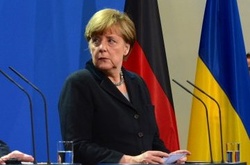 Меркель запевнила, що вирішувати українське питання без України не будуть