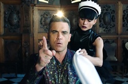  Робби Уильямс высмеял русских олигархов в новом клипе