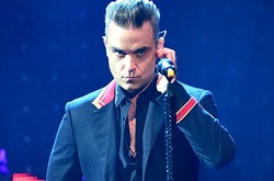 Робби Уильямс больше не сможет танцевать на сцене из-за артрита