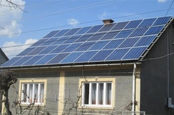 Сонячні батареї на будинках