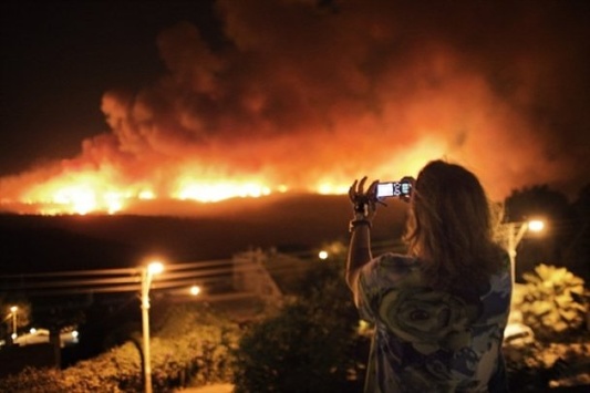 Десятки літаків пожежної ескадрильї борються з пожежею в Ізраїлі