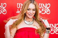 Линдси Лохан закрутила роман со своим новым менеджером Скоттом Карлсеном