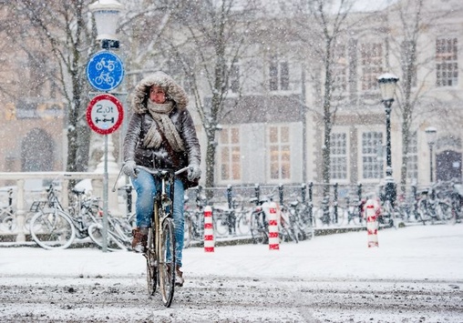 Незважаючи на морози: у п’ятницю киянам пропонують їхати на роботу велосипедом