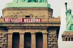 На статую Свободи вивісили банер «Біженці, ласкаво просимо»