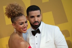 Леди в красном: Дрейк вывел новую девушку в свет