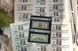 Фальшиві долари США