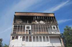 Будинок у Красногорівці, куди влучив снаряд бойовиків