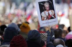  Зображення Володимира Путіна у вигляді російського царя під час маршу пам’яті вбитого неподалік Кремля опозиційного політика Бориса Нємцова. Москва, 27 лютого 2016 року 