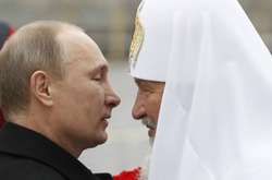 Путін та московський патріарх РПЦ Кирило