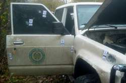 Расстрелянный автомобиль, в котором ехала Окуева с мужем