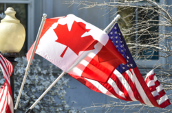 Прапори Канади та США