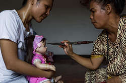 Странные игрушки: в Таиланде массово «усыновляют» кукол