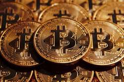 Курс біткоїна підбирається до позначки в $12 тисяч
