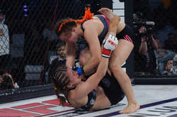 Безкомпромісний бій дівчат і суворі сутички чоловіків. Фотогалерея з турніру зі змішаних єдиноборств у Києві