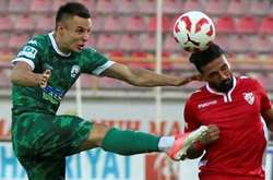 Дмитро Коркішко (зліва)