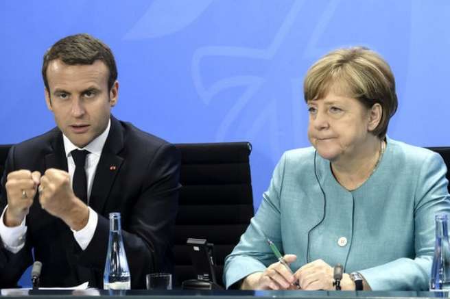 Меркель та Макрон прокоментували обмін полоненими на Донбасі
