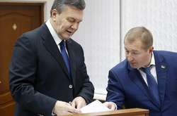 Віктор Янукович і його адвокат Віталій Сердюк