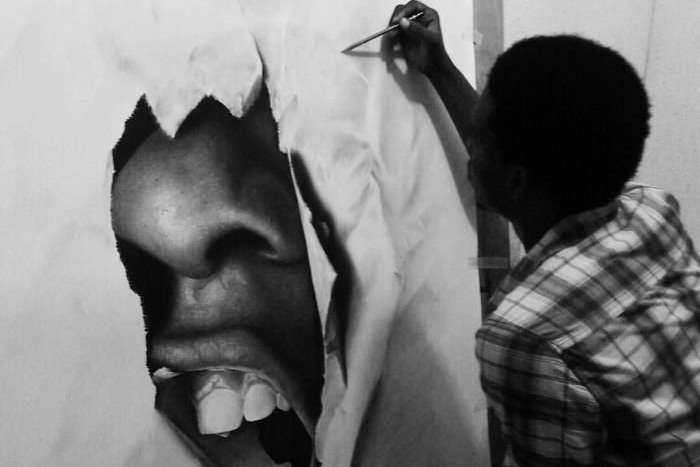 Нігерійський художник створює картини, які неймовірно схожі на фотографії