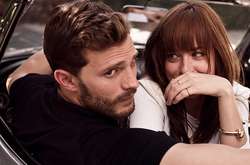 Джейми Дорнан и Дакота Джонсон