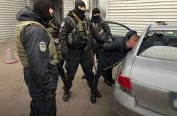 Нацполіція викрила вісім посадовців ДМС, які торгували біометричними паспортами