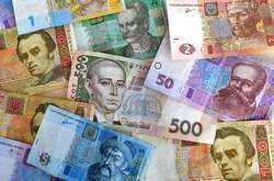 Нацбанк зміцнив гривню до 26,65 за долар