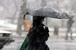 Увечері Київ та область накриють дощі