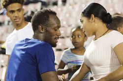 Усейн Болт з Касі Беннетт. Фото: Getty Images