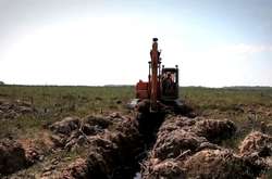 Оголошено про підозру чоловіку, який під Ірпенем добув торфу на 4 млн грн