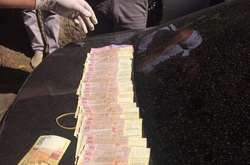 В Одеській області спіймали на хабарі головного ревізора і податківця