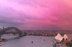 Розовый Сидней: В соцсети опубликовали невероятные снимки неба перед штормом